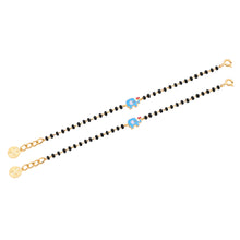 Load image into Gallery viewer, Two bracelets with colorful charms on a white background
