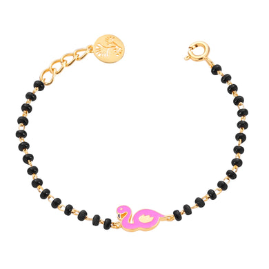 Bracelet with black beads and a pink flamingo charm on a white background