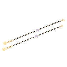 Load image into Gallery viewer, Two gold and black beaded bracelets on a white background
