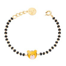 Load image into Gallery viewer, Bracelet with black beads and gold accents on a white background
