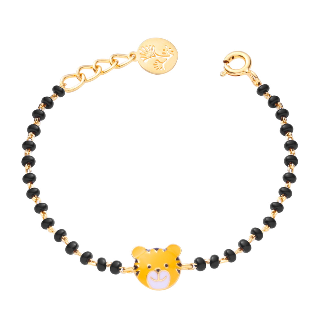 Bracelet with black beads and gold accents on a white background